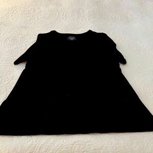 Slight scooped neck Chico’s top. Year round basic you will go to again & again.